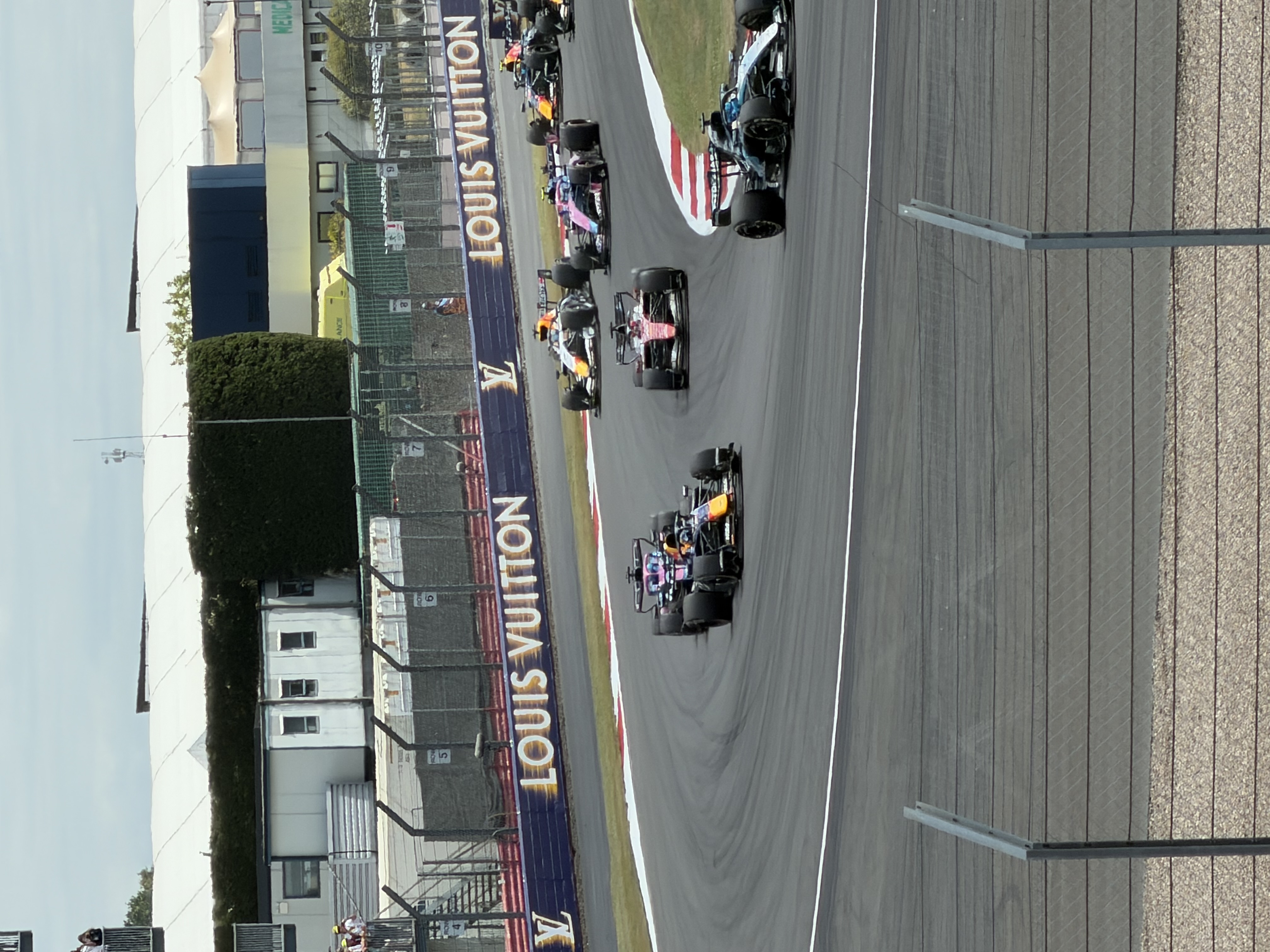 Cars through the corner at Silverstone during the British Grand Prix weekend
